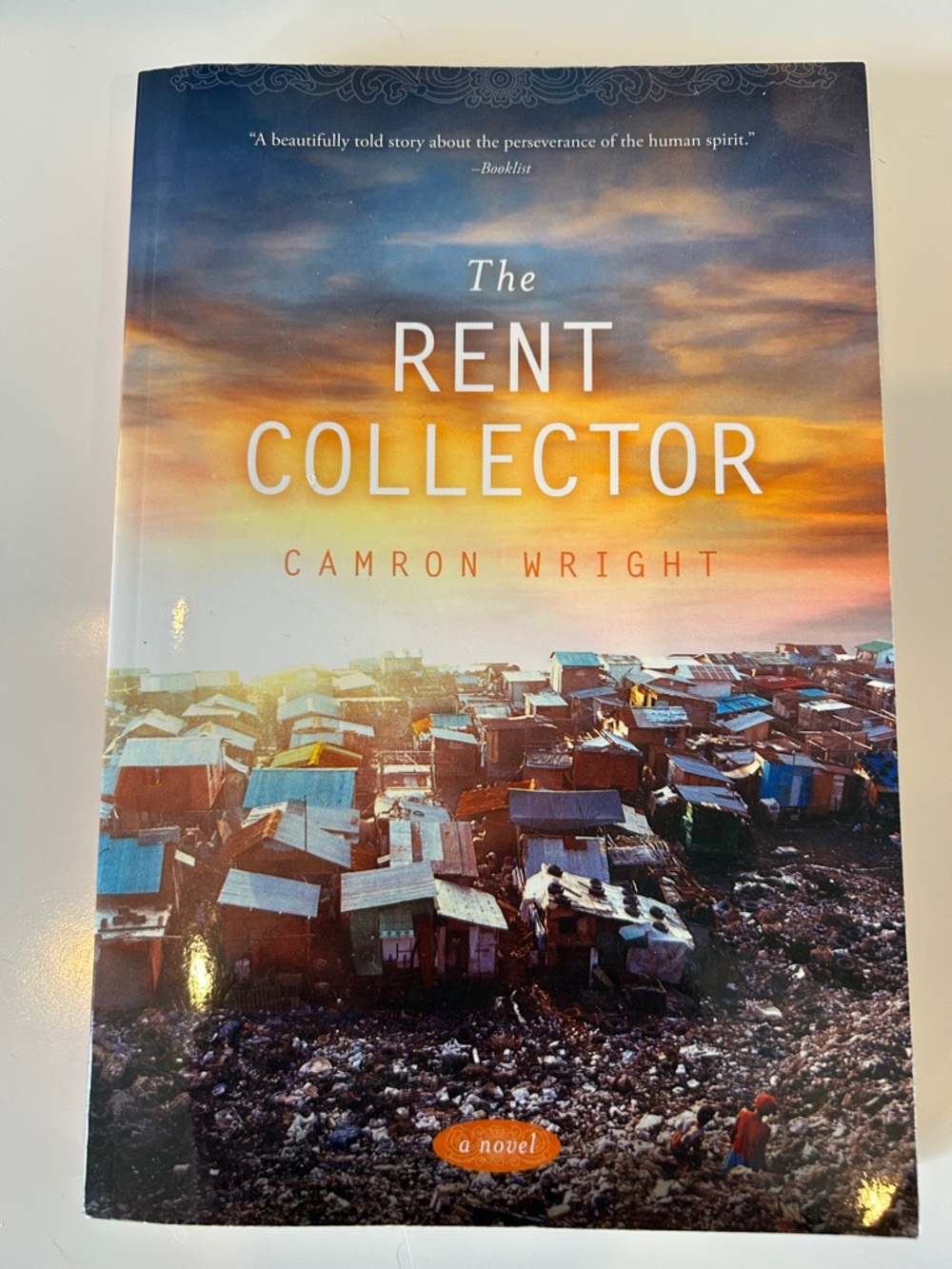 The Rent Collector by Camron Wright - Sunset Cover